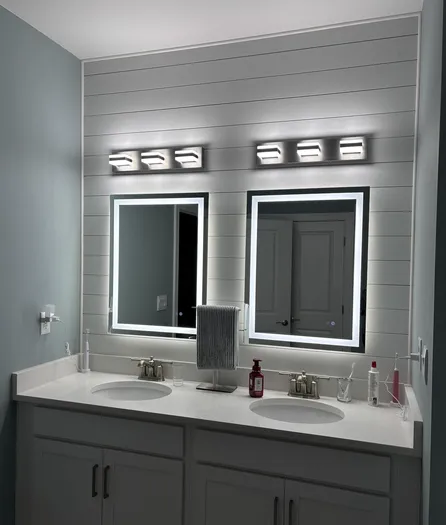 Large mirror hung level on a living room wall