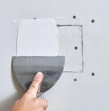 Drywall patch repair with smooth paint-ready finish