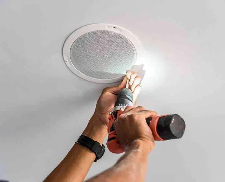 In-ceiling speaker installation in a finished living room
