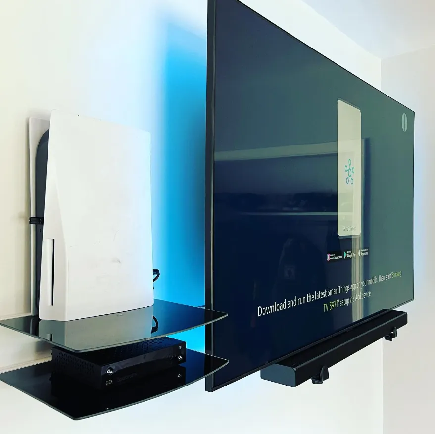PlayStation and Xbox setup with hidden wiring