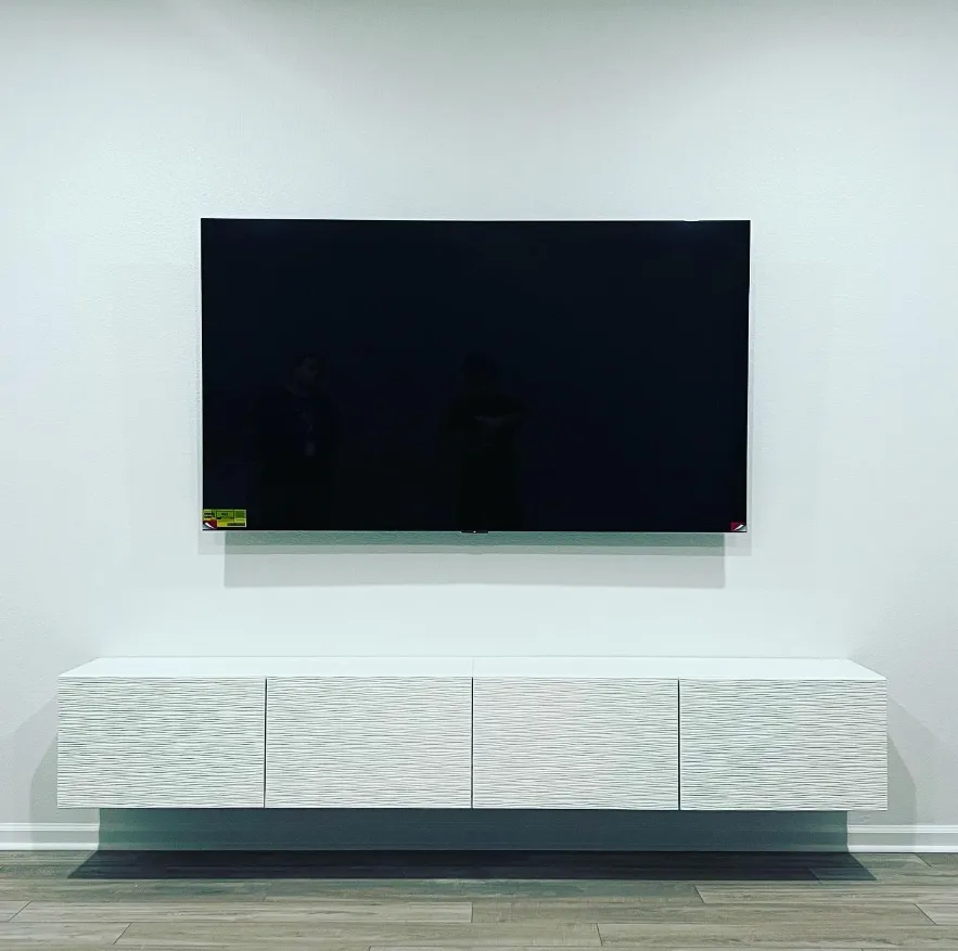 In-wall rated cable routing in a living room