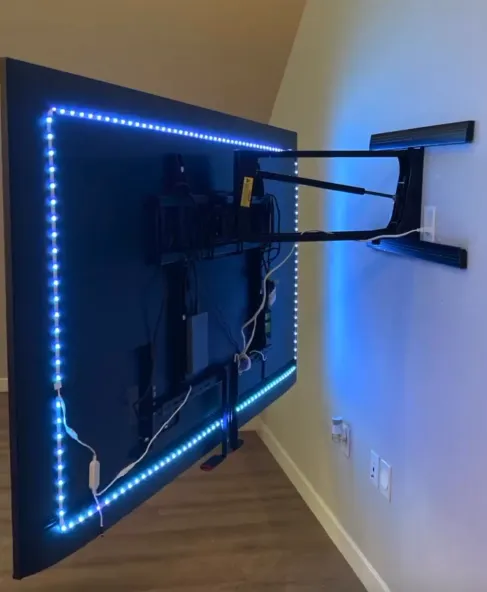 LED strip routing hidden behind shelving
