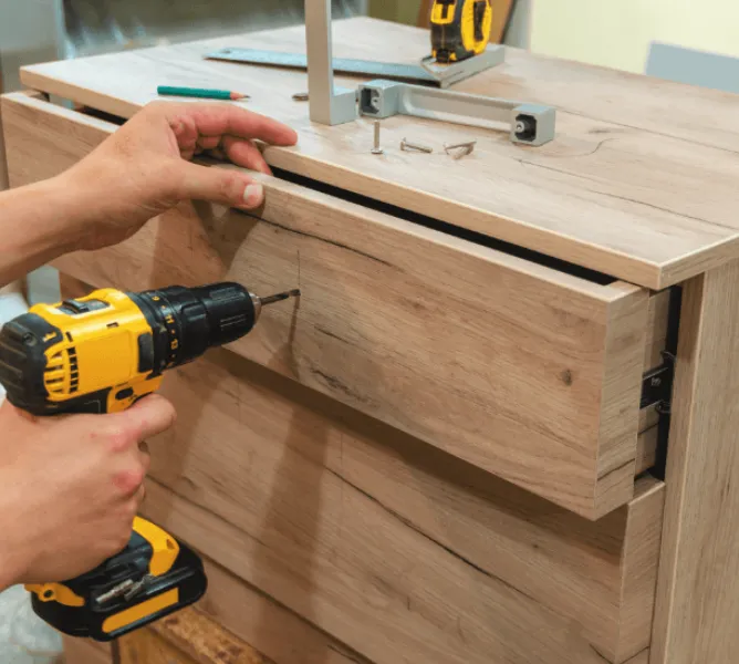 Bed frame and headboard assembly in a bedroom