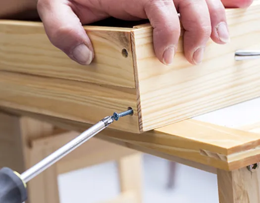 Door hinge and hardware repair in a home