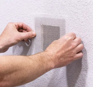 Drywall hole patched and sanded smooth