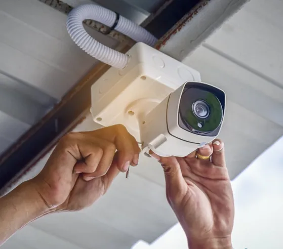 Indoor security camera mounted in a hallway